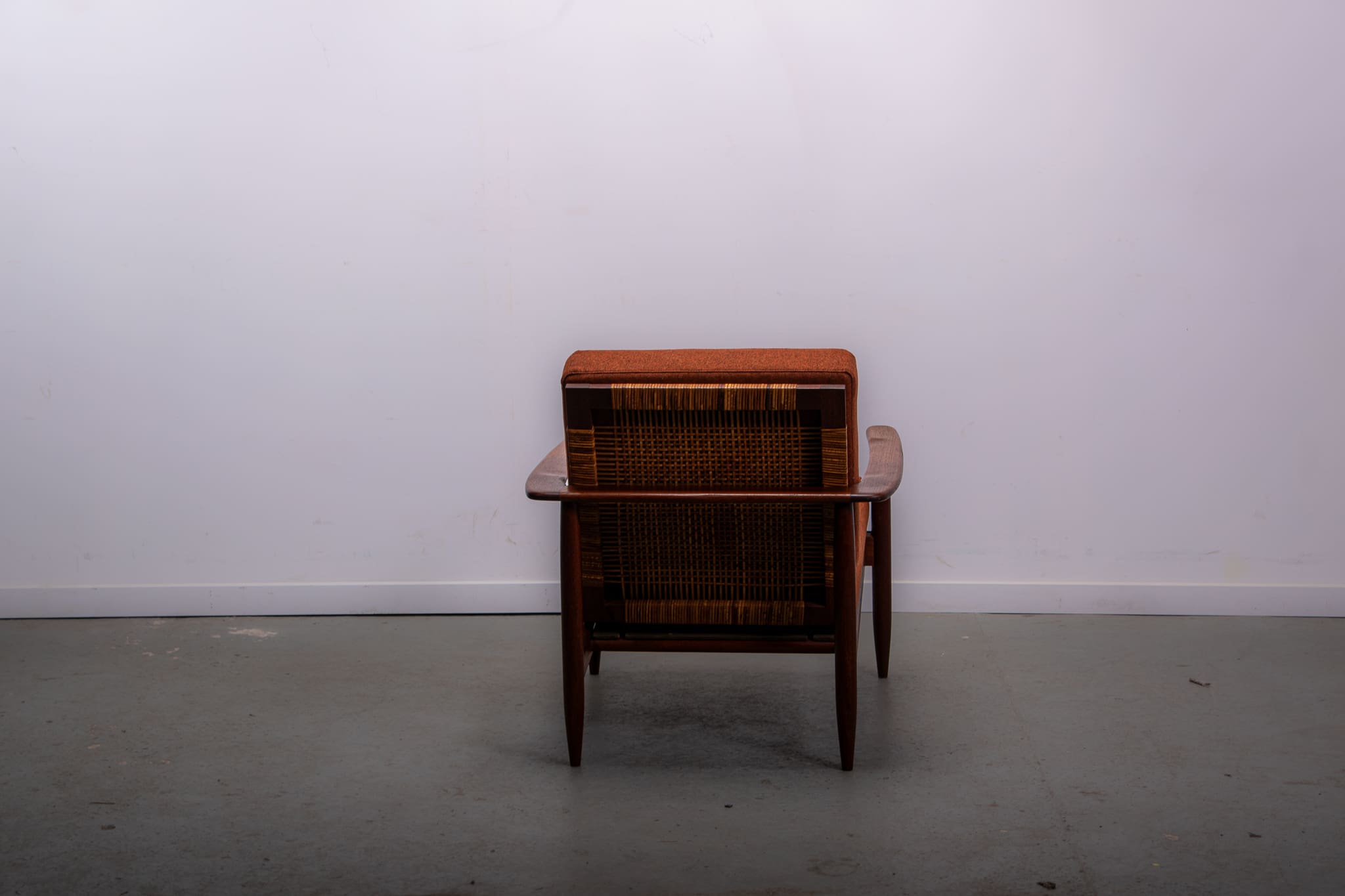 Mid-century easy chair in teak and cane circa 1970