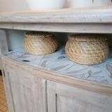 Low furniture refurbished in bleached wood