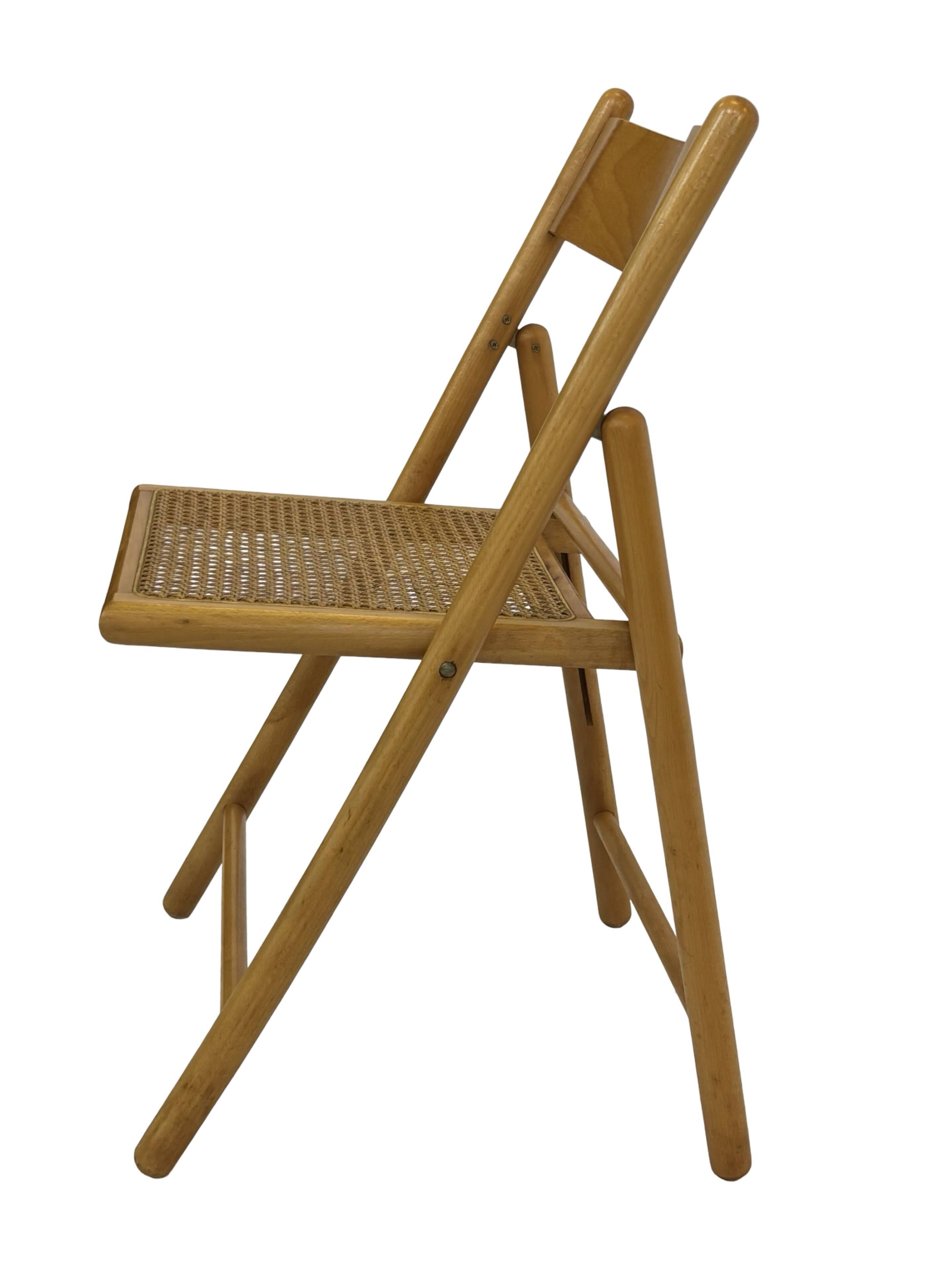 Vintage wooden folding chair with rattan seat 80s minimalist design