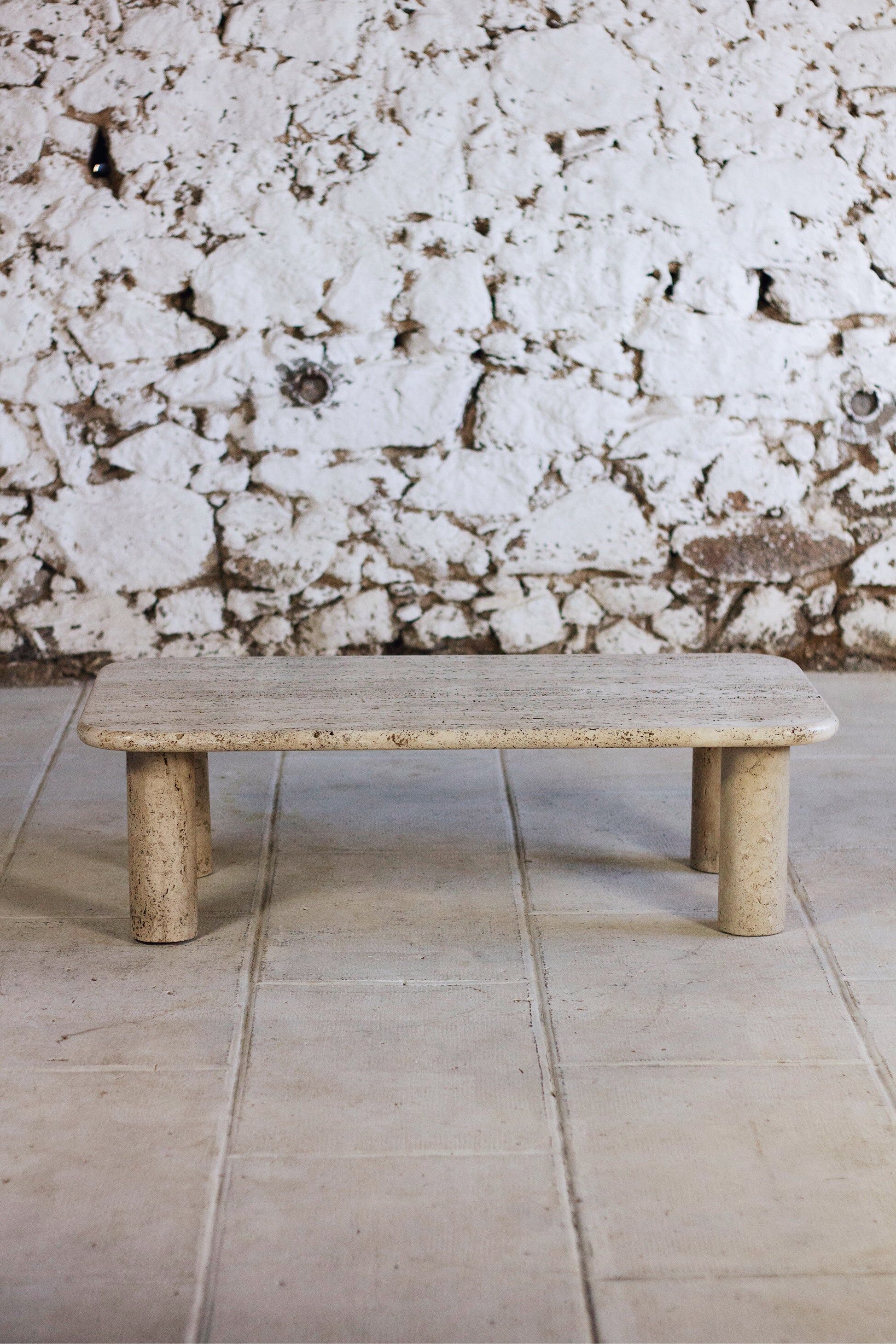 Travertine coffee table in the style of Angelo Mangiarotti, 1970.