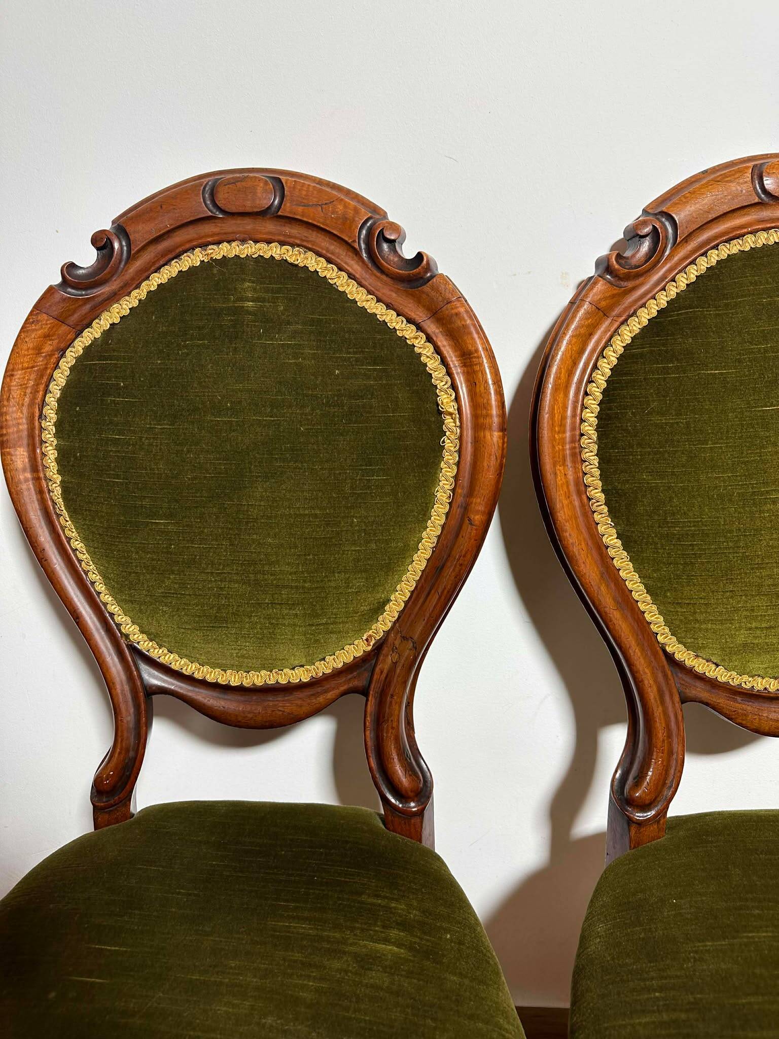 A pair of antique upholstered side chairs/Victorian balloon-back