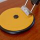 Articulated orange Aluminor desk lamp industrial design 70s