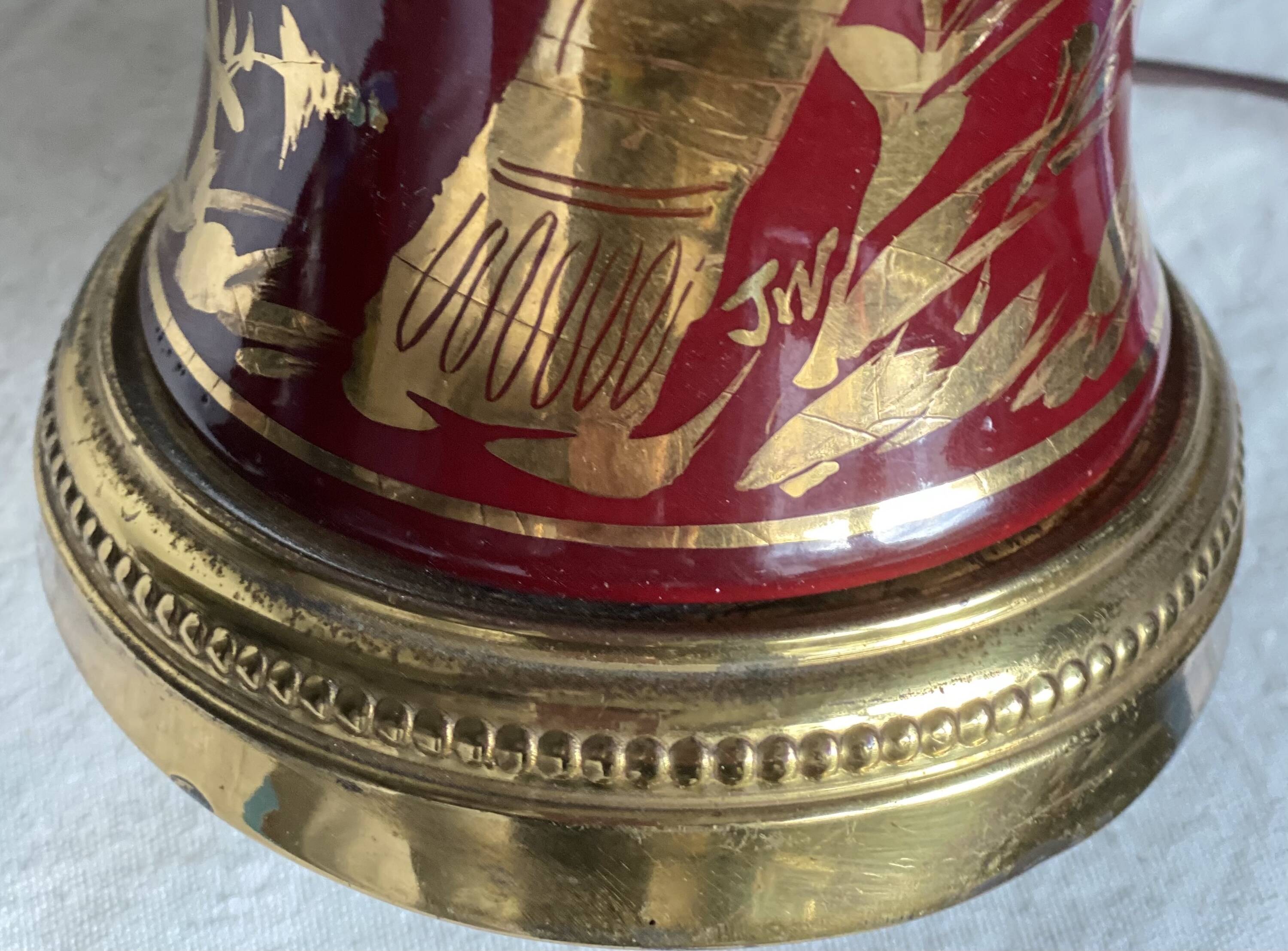 Vintage 1970 red and gold ceramic lamp with oriental decorations.