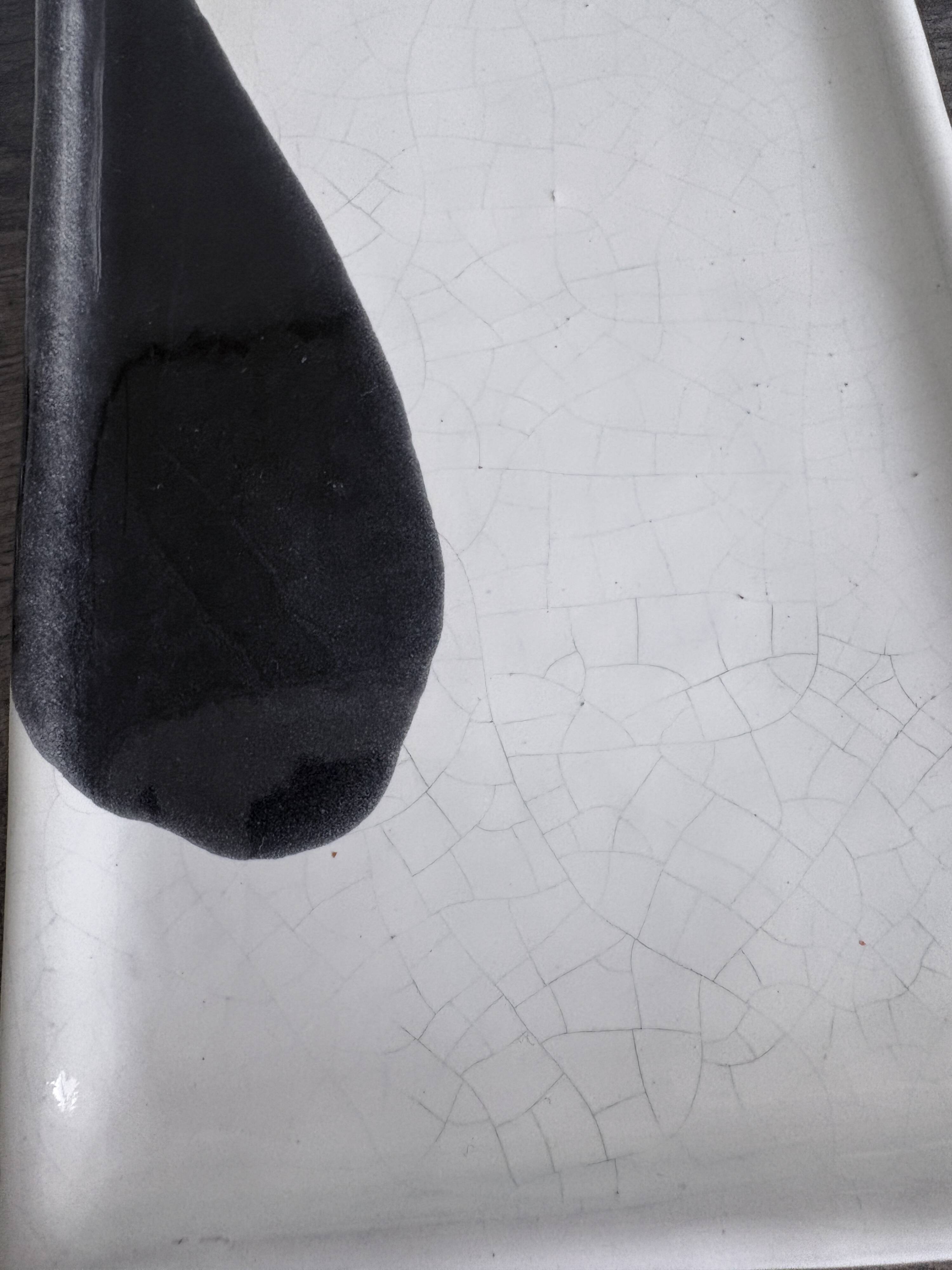 Lot of 4 rectangular glazed terracotta plates.