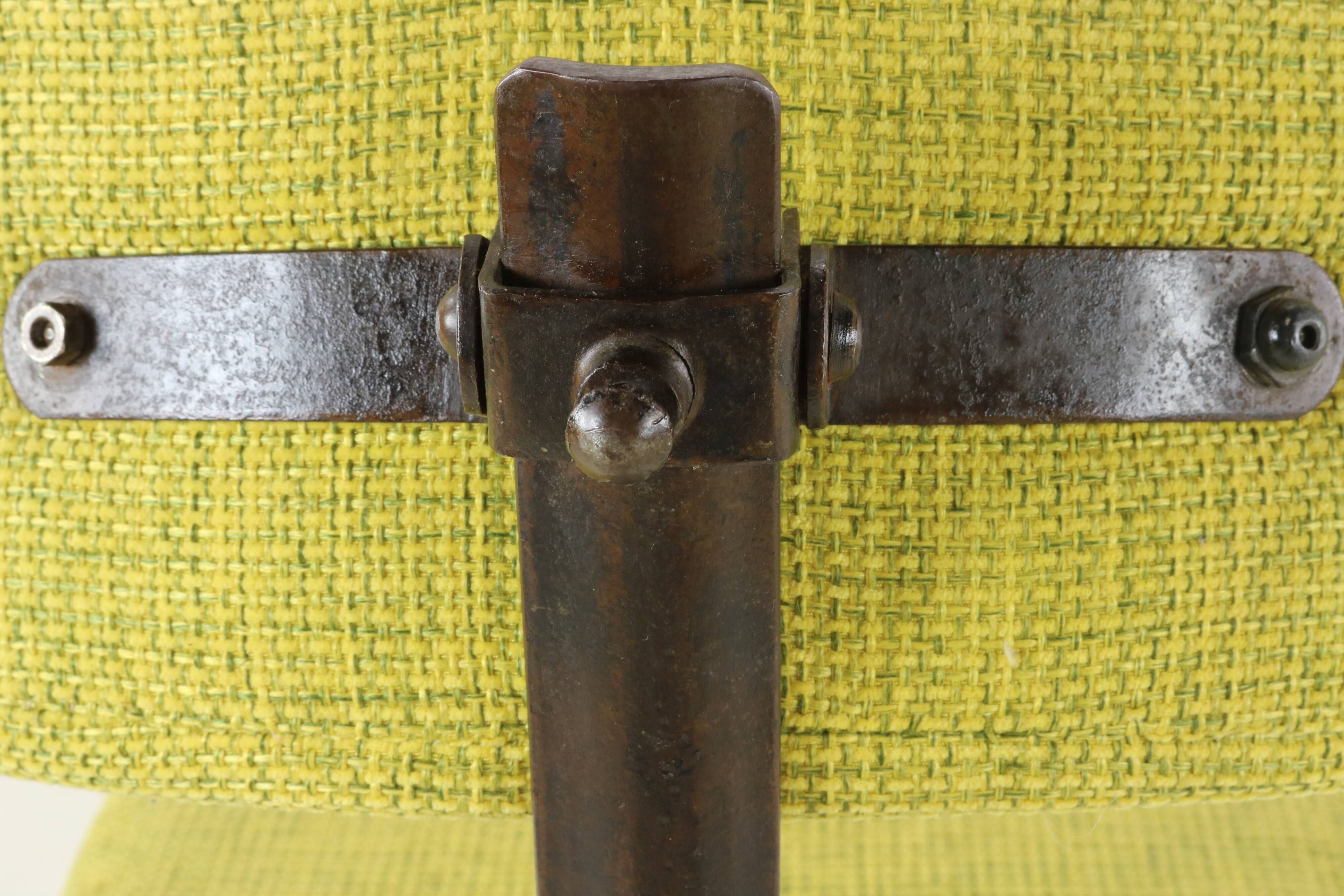 Fifties design working chair with stabilizing wooden ring base