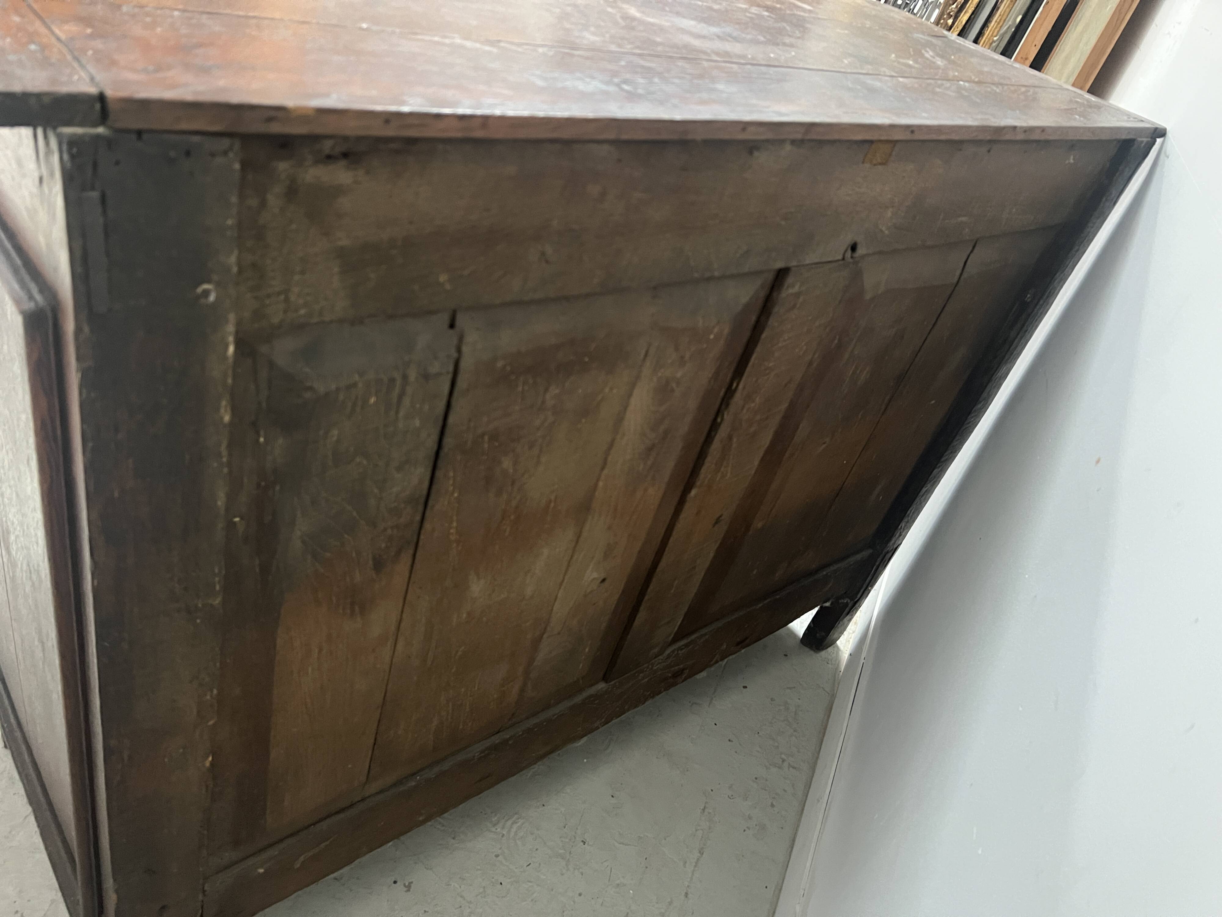 Two-door buffet in solid oak, Louis XIV style, 18th century.