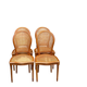 4 caned Louis XVI medallion dining chairs from the 1960s.