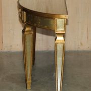Half-moon console Eglomise Theodore Alexander with a gold finish.