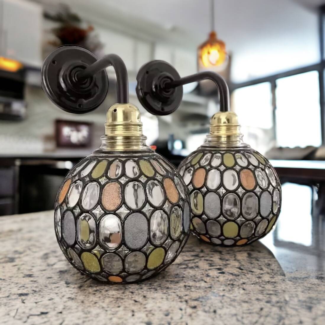 Pair of faceted glass globe wall lights