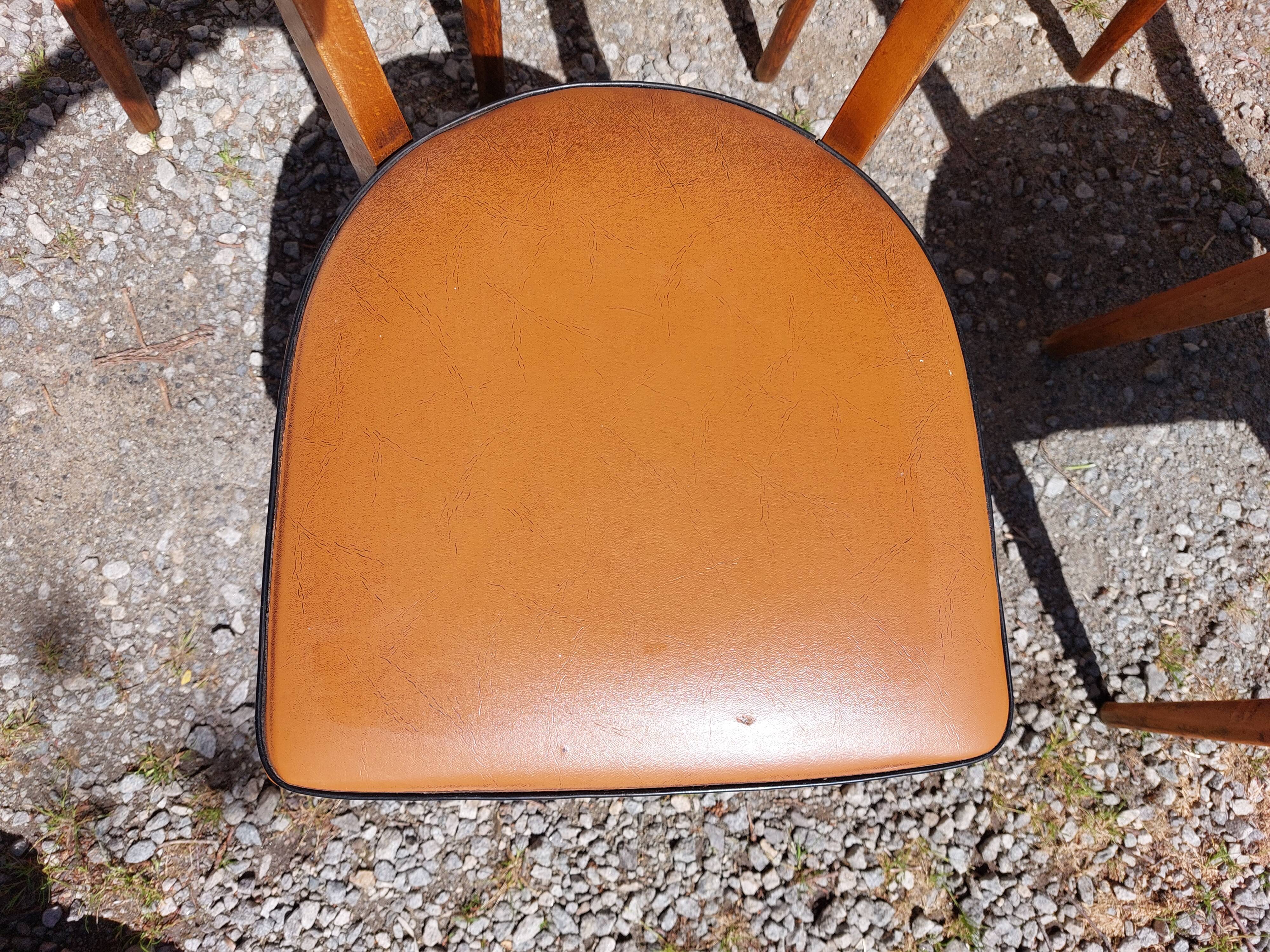6 vintage 1960s wooden bistro chairs with camel faux leather.