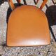 6 vintage 1960s wooden bistro chairs with camel faux leather.