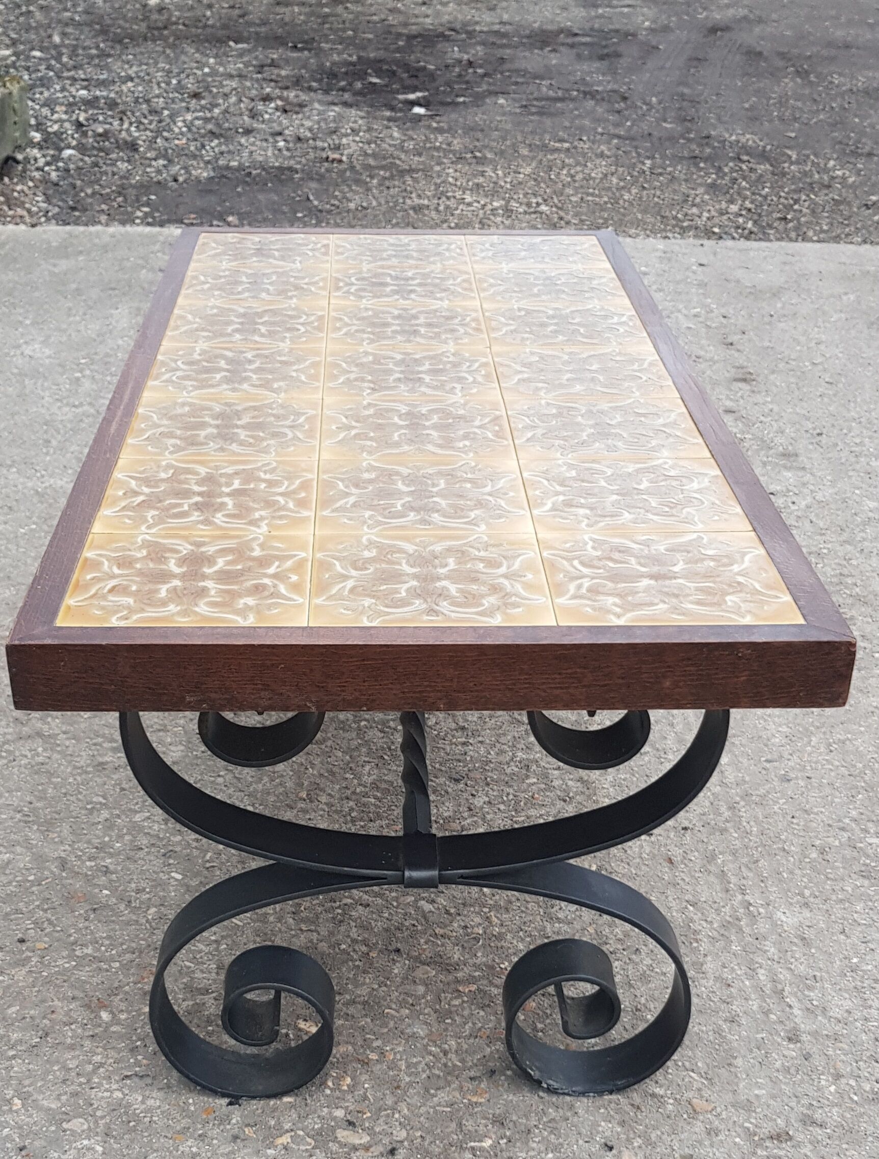 Antique vintage coffee table with glazed earthenware top