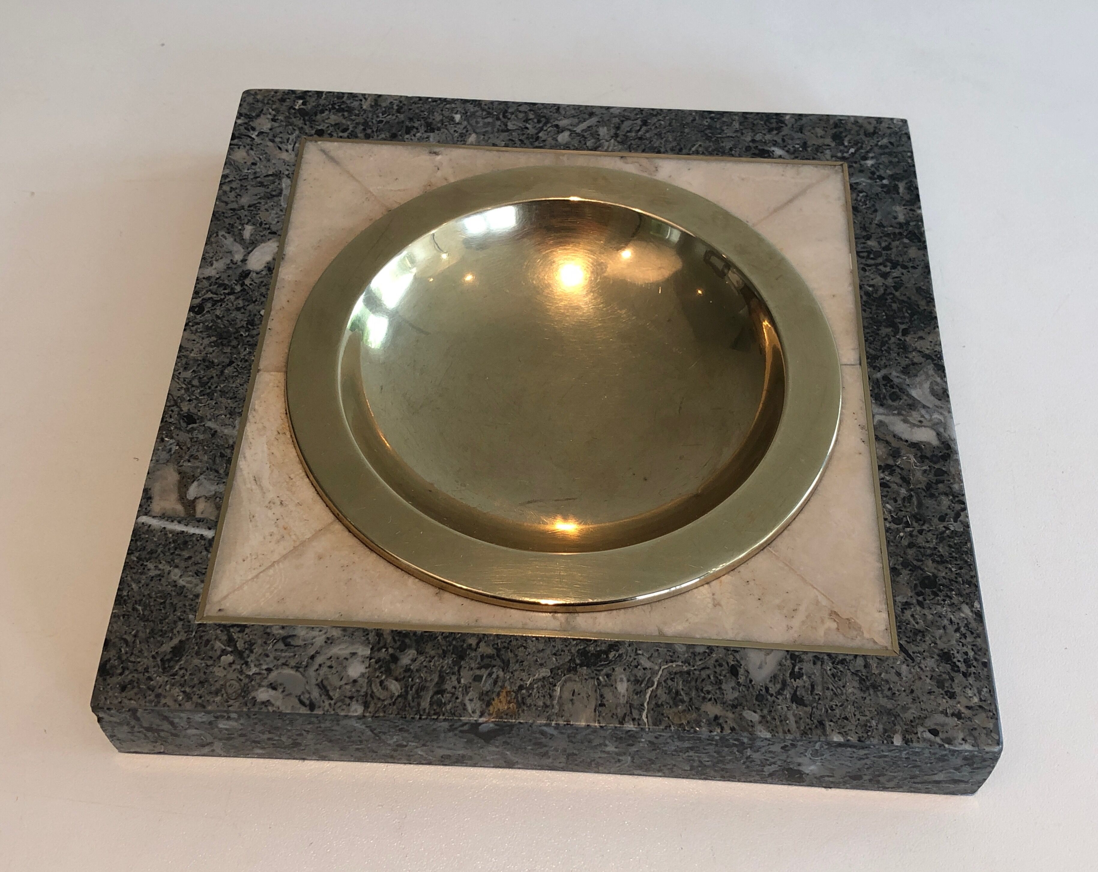 Neoclassical style pocket empty in faux-marble and brass. french work. around 1970