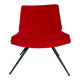 Vintage red faux fur armchair with black metal legs.