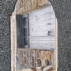 Miroir à suspendre des années 30, art déco, en bois ciselé, miroir biseauté