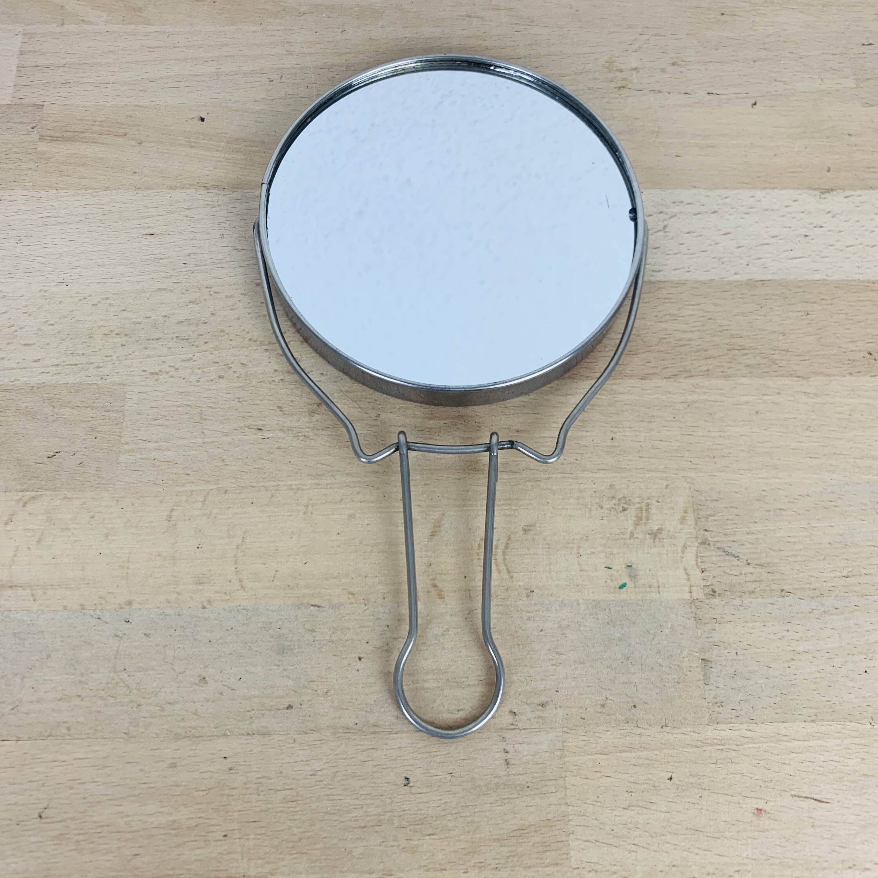 Round double-sided magnifying barber mirror