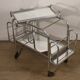 Vintage 1970s rolling dessert trolley in chrome metal and mirrored glass.