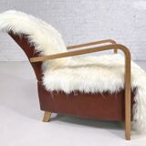 Scandinavian style armchair in leather and hide