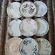 13 mismatched flat plates in ironstone