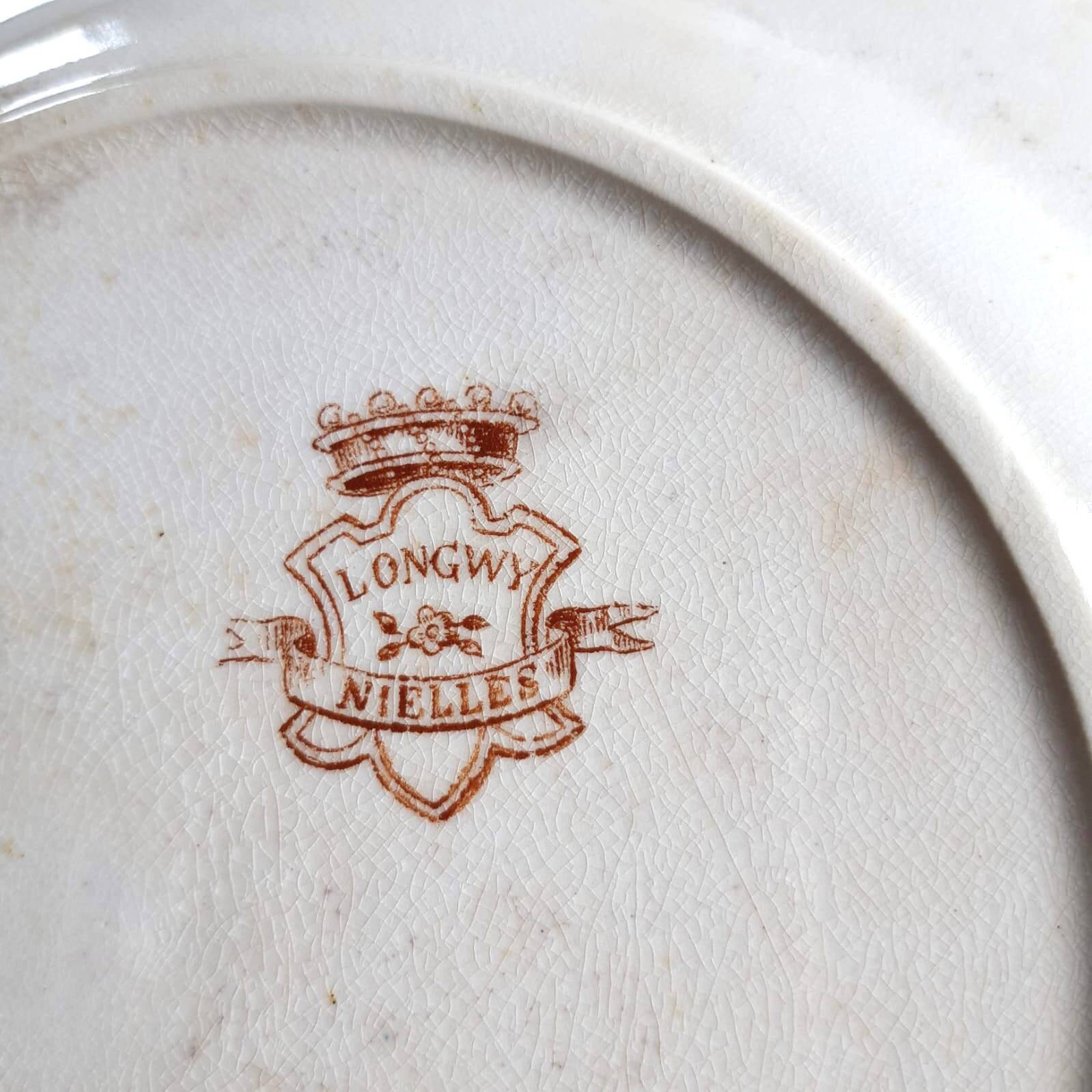 Set of 7 nielles model plates in longwy earthenware, art nouveau, circa 1900