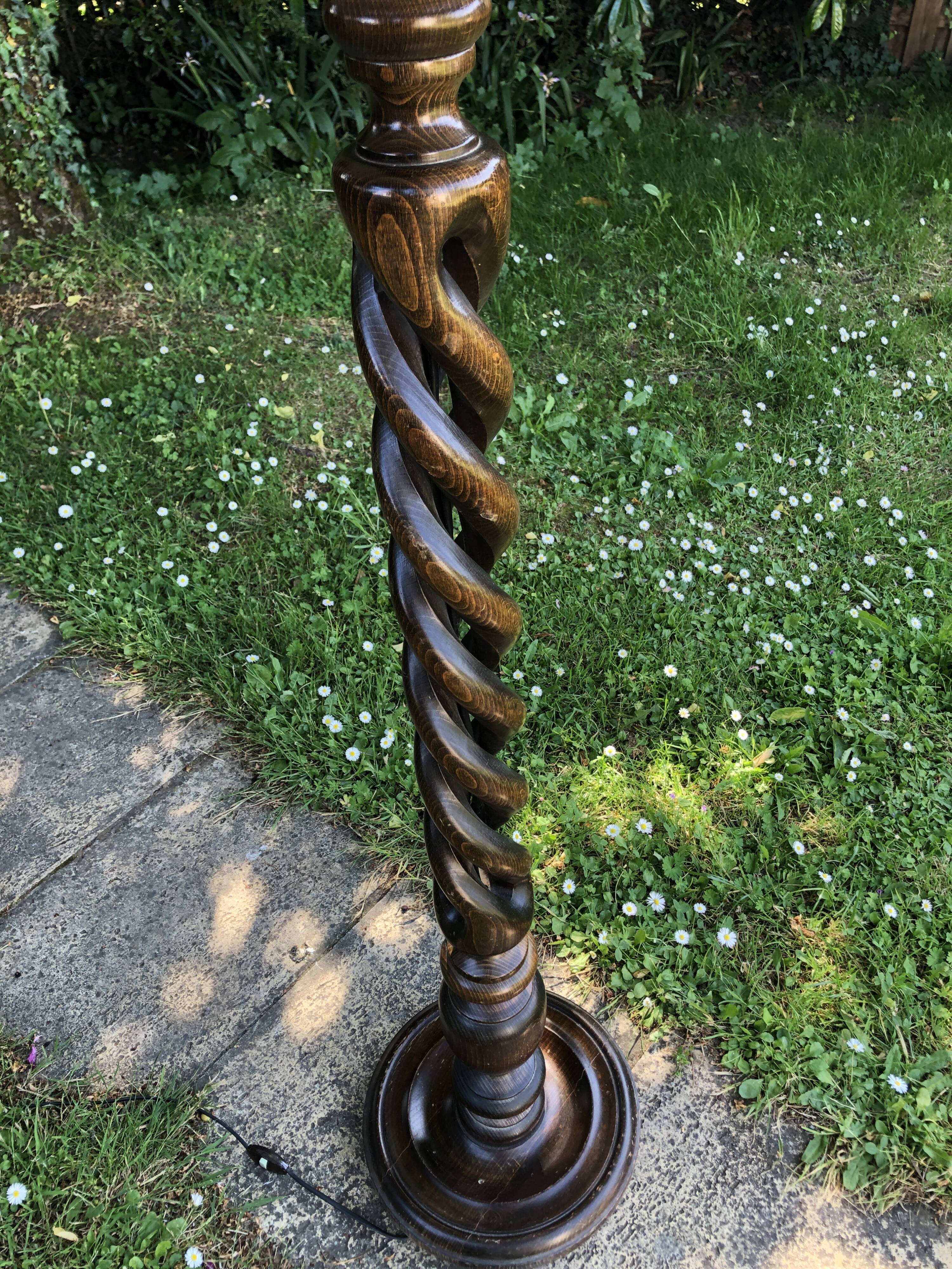 Dark turned wooden floor lamp and wool lampshade