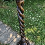 Dark turned wooden floor lamp and wool lampshade