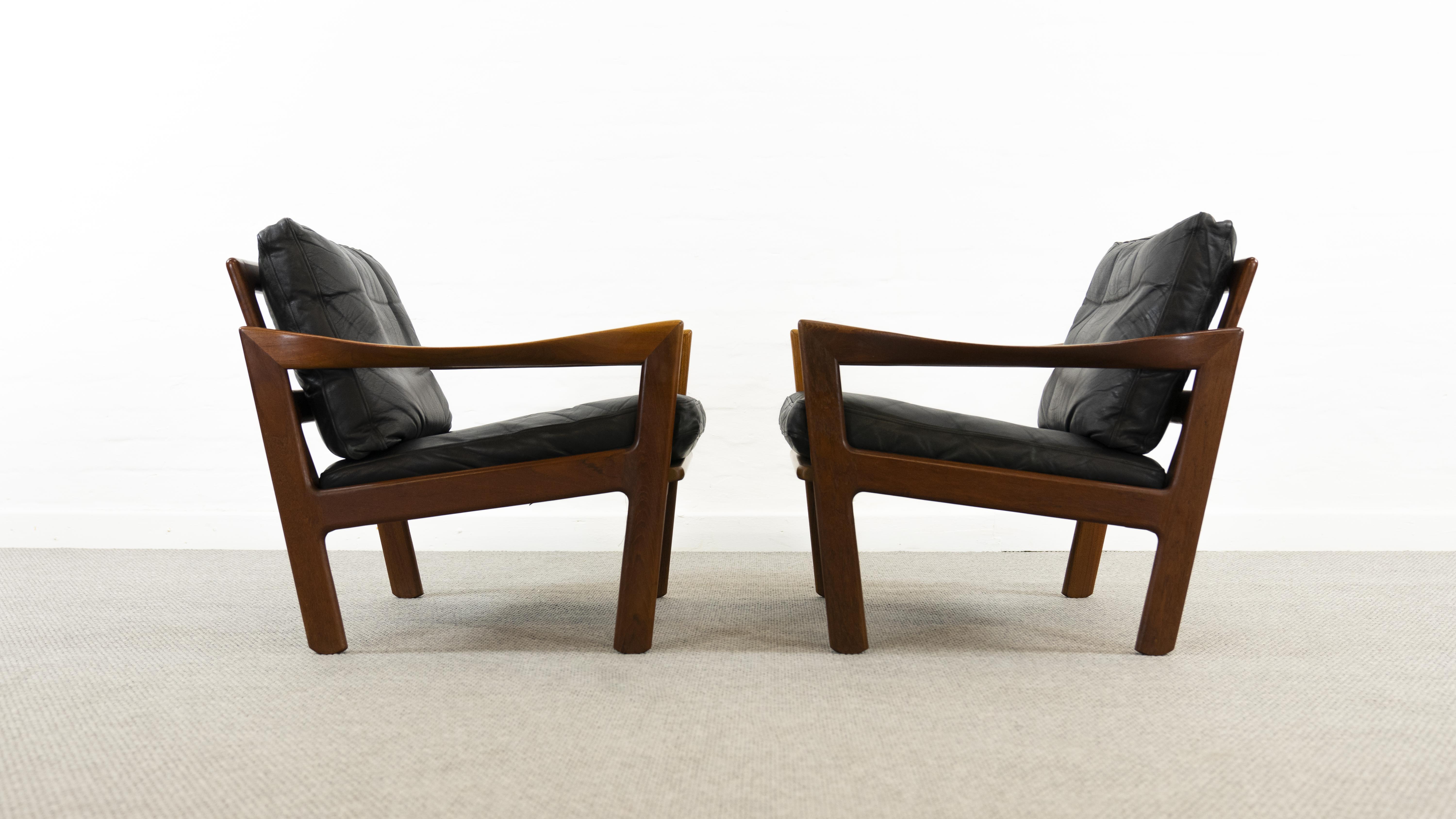 Pair of teak chairs in black leather by Illum Wikkelsoe for Niels Eilersen, Denmark