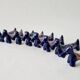 Set of 8 vintage ceramic knife rests, retro dog design.