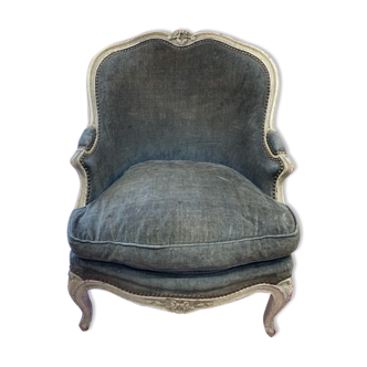 Green velvet shepherdess armchair