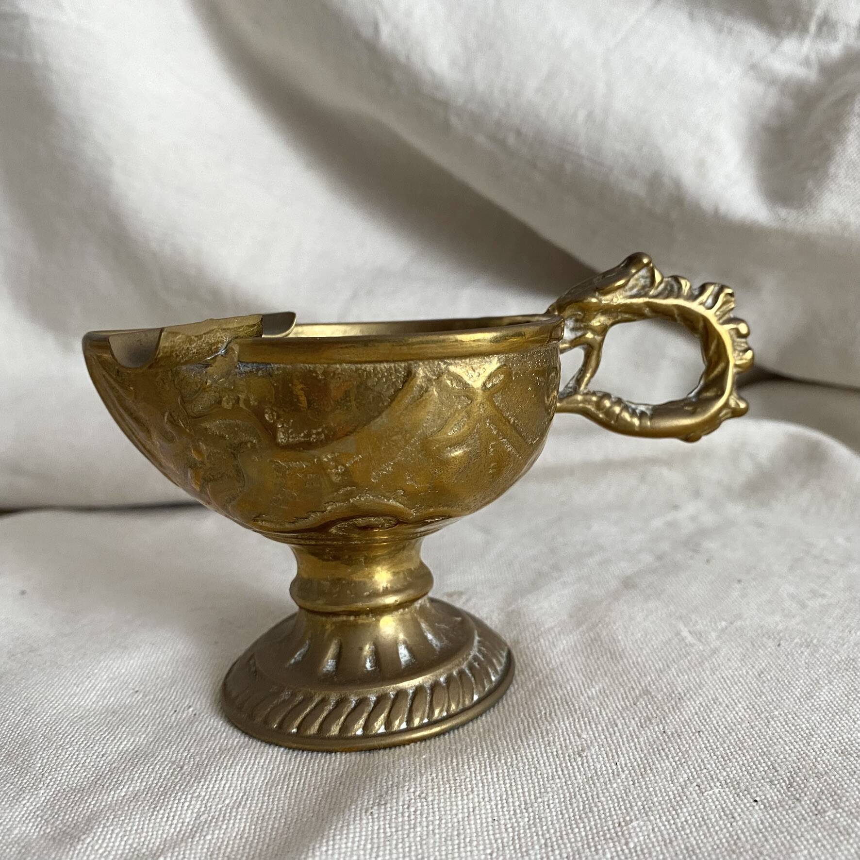 Antique embossed brass ashtray