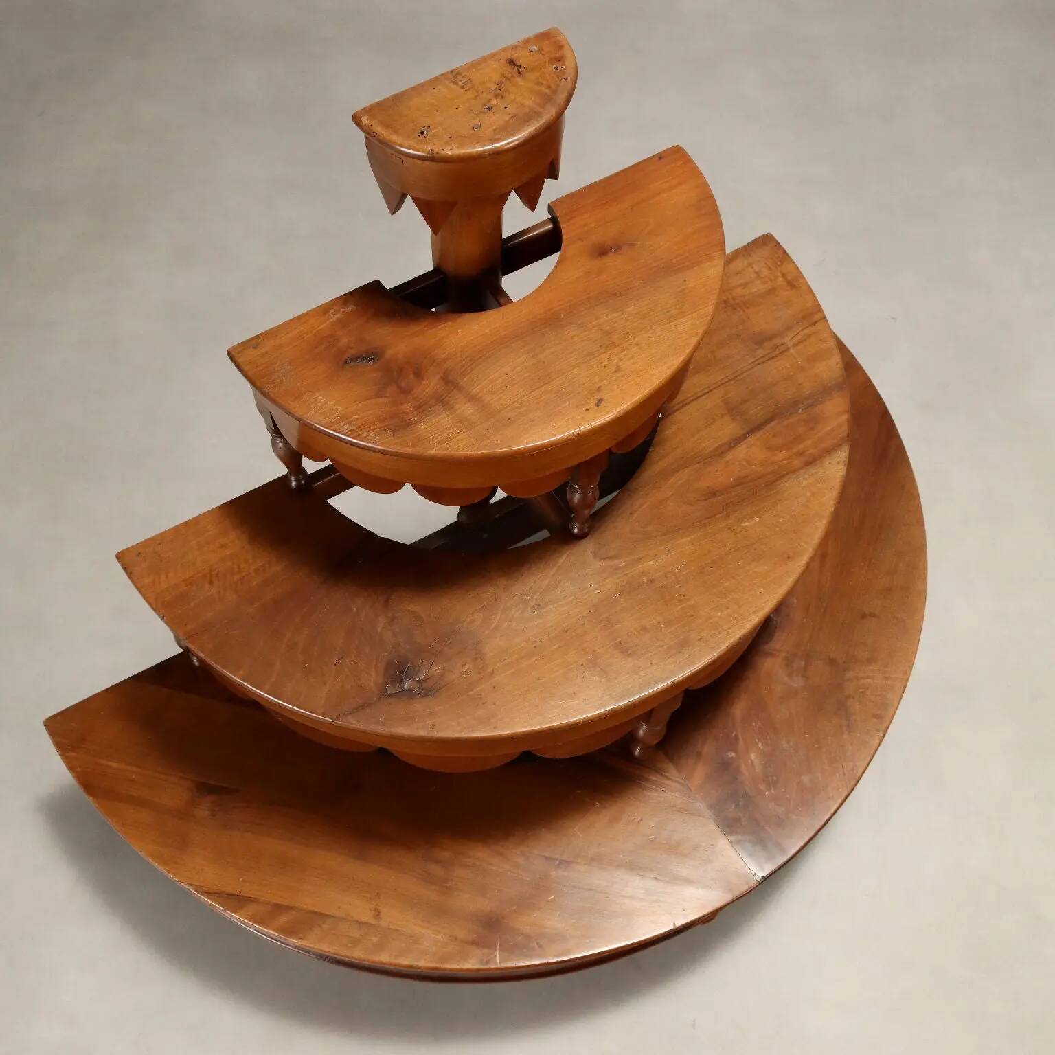 Antique walnut shelf in a semi-round shape, Italy, 19th century.