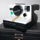 Polaroid 1000 bouton vert et sa sacoche