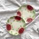 2 old slip plates decorated with roses