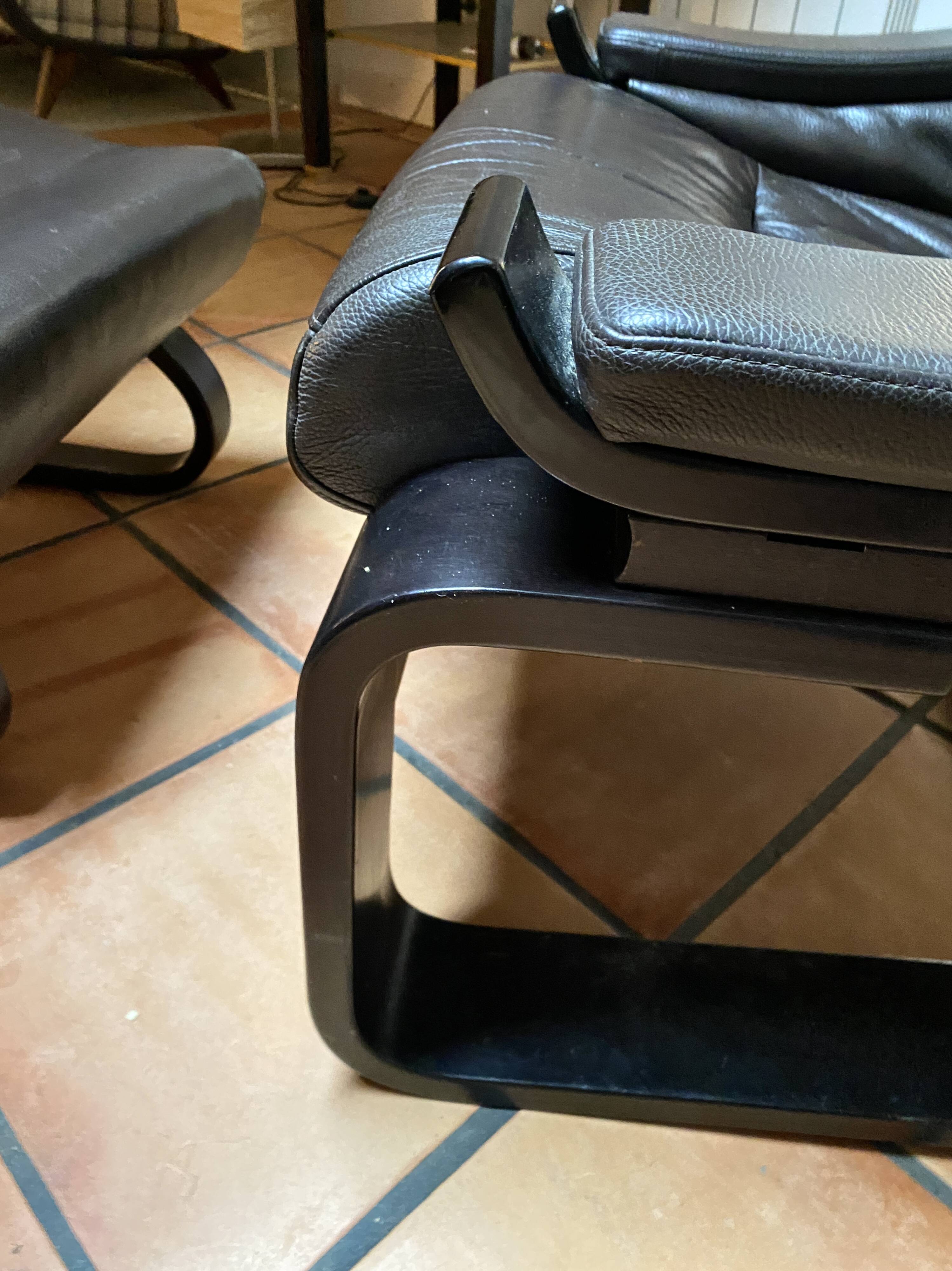 Pair of armchairs and their ottomans by ake fribytter for nelo sweden 1970