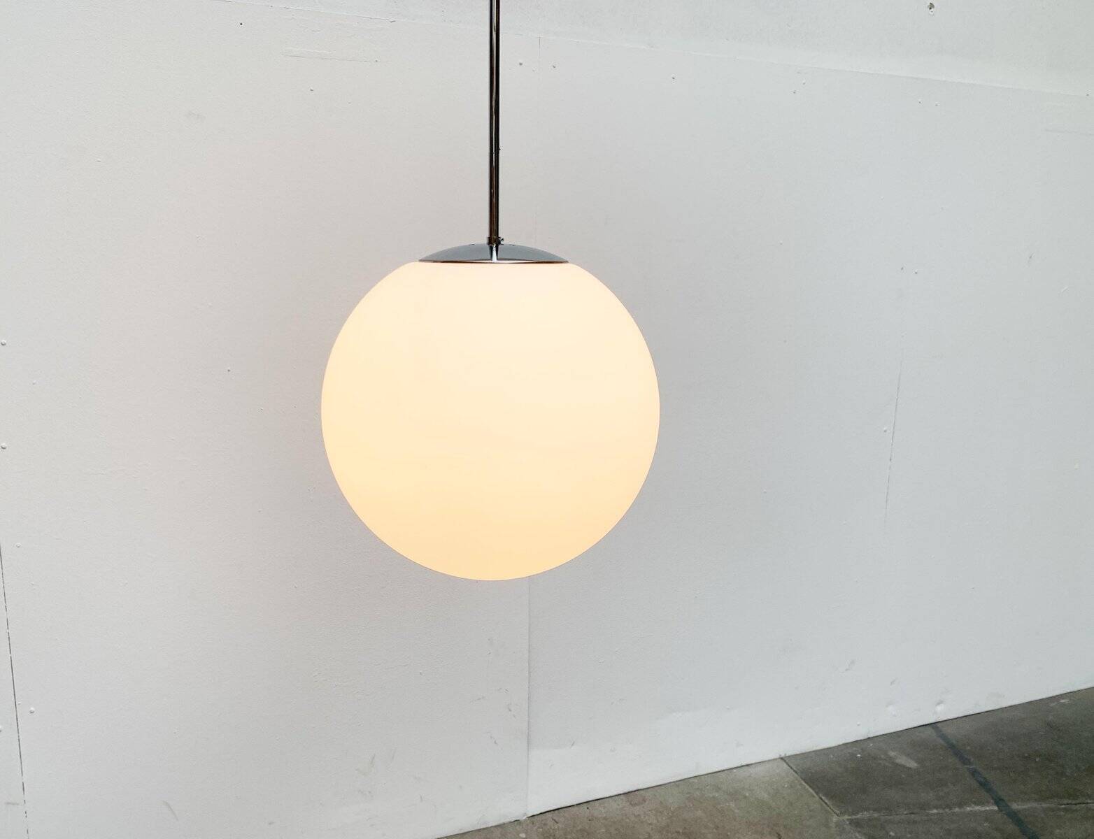 Vintage German space age glass ball pendant lamp by Limburg.