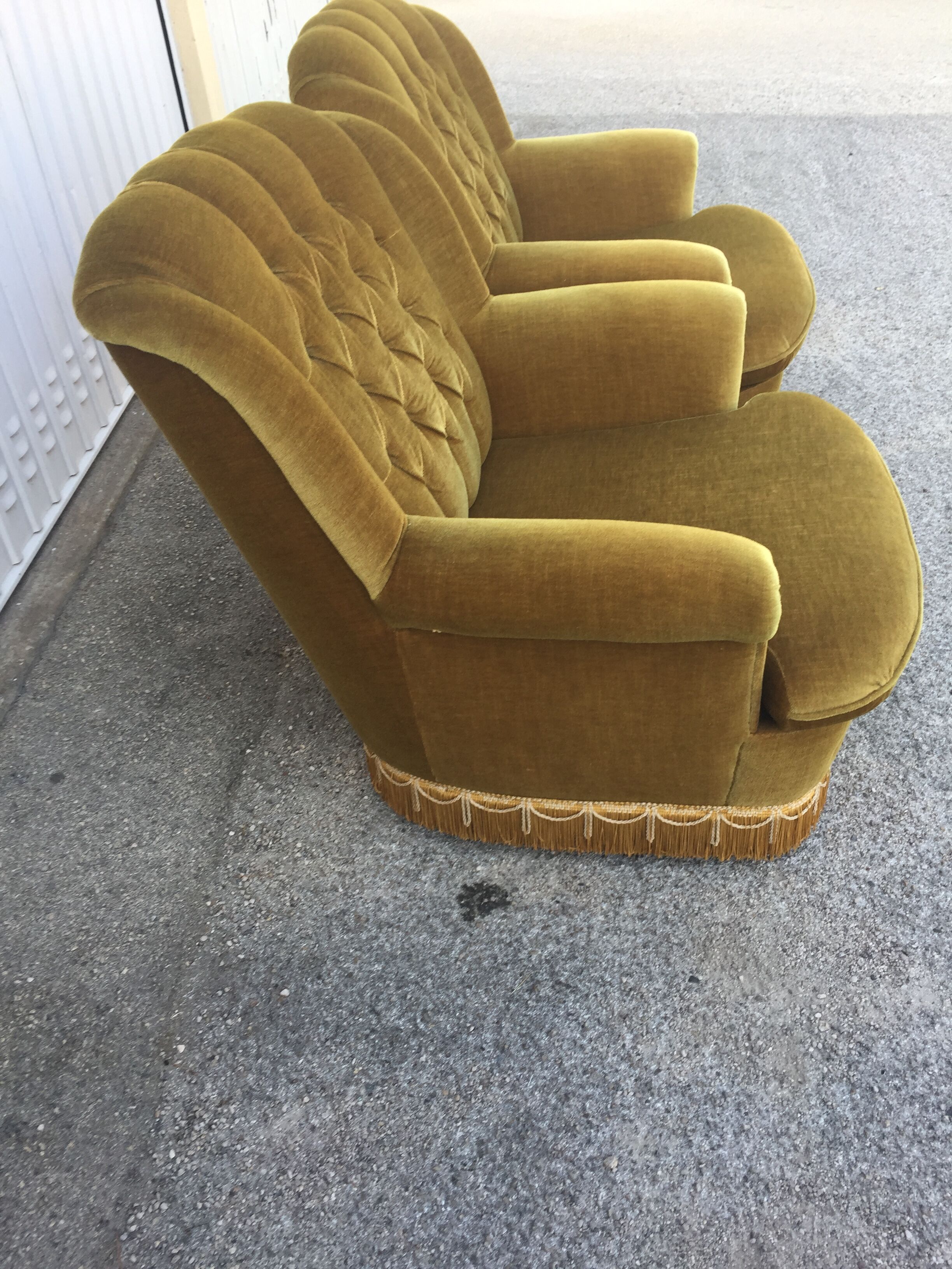 Pair of upholstered velvet armchairs