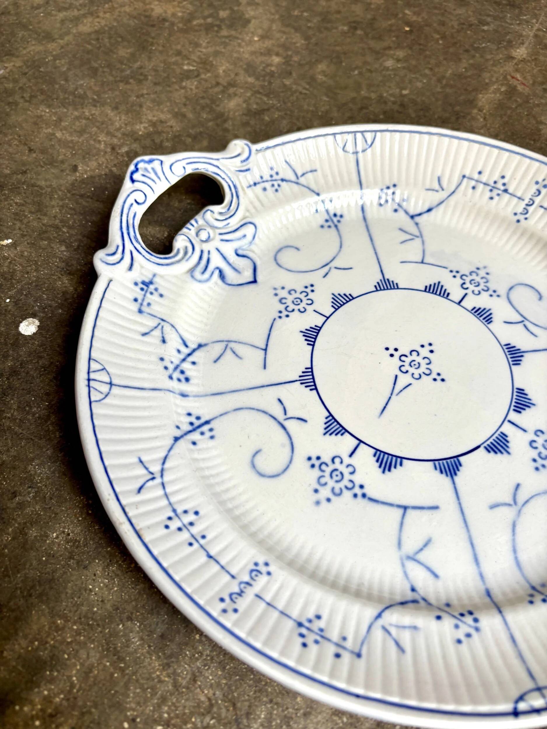 Round earthenware plate by Boch La Louvière in blue glazed earthenware, "Copenhagen" service - 1920s-30s.