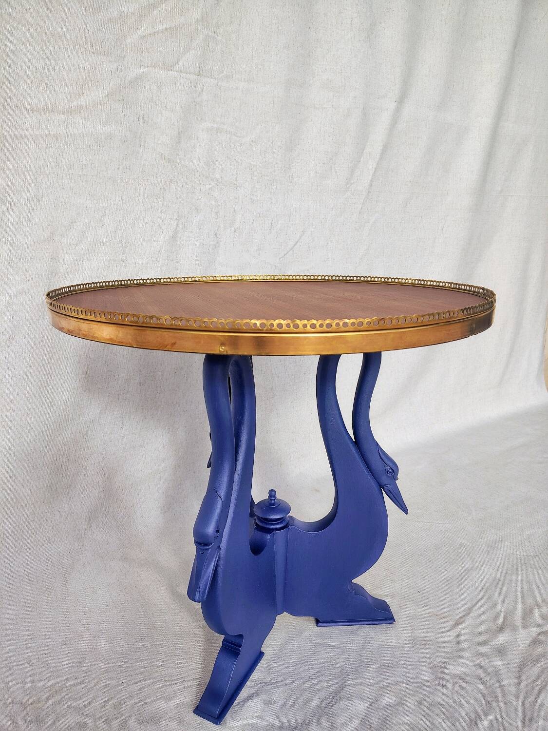Side table with swan legs