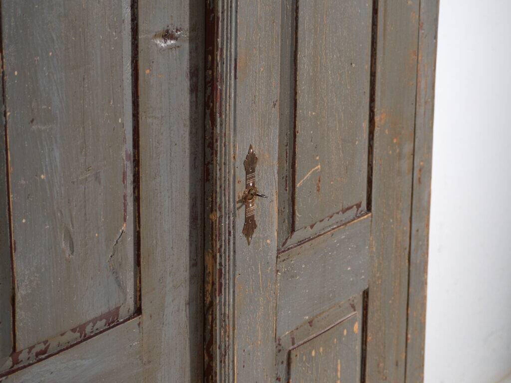 Rustic painted wardrobe in wood, Central Europe, circa 1900–1920