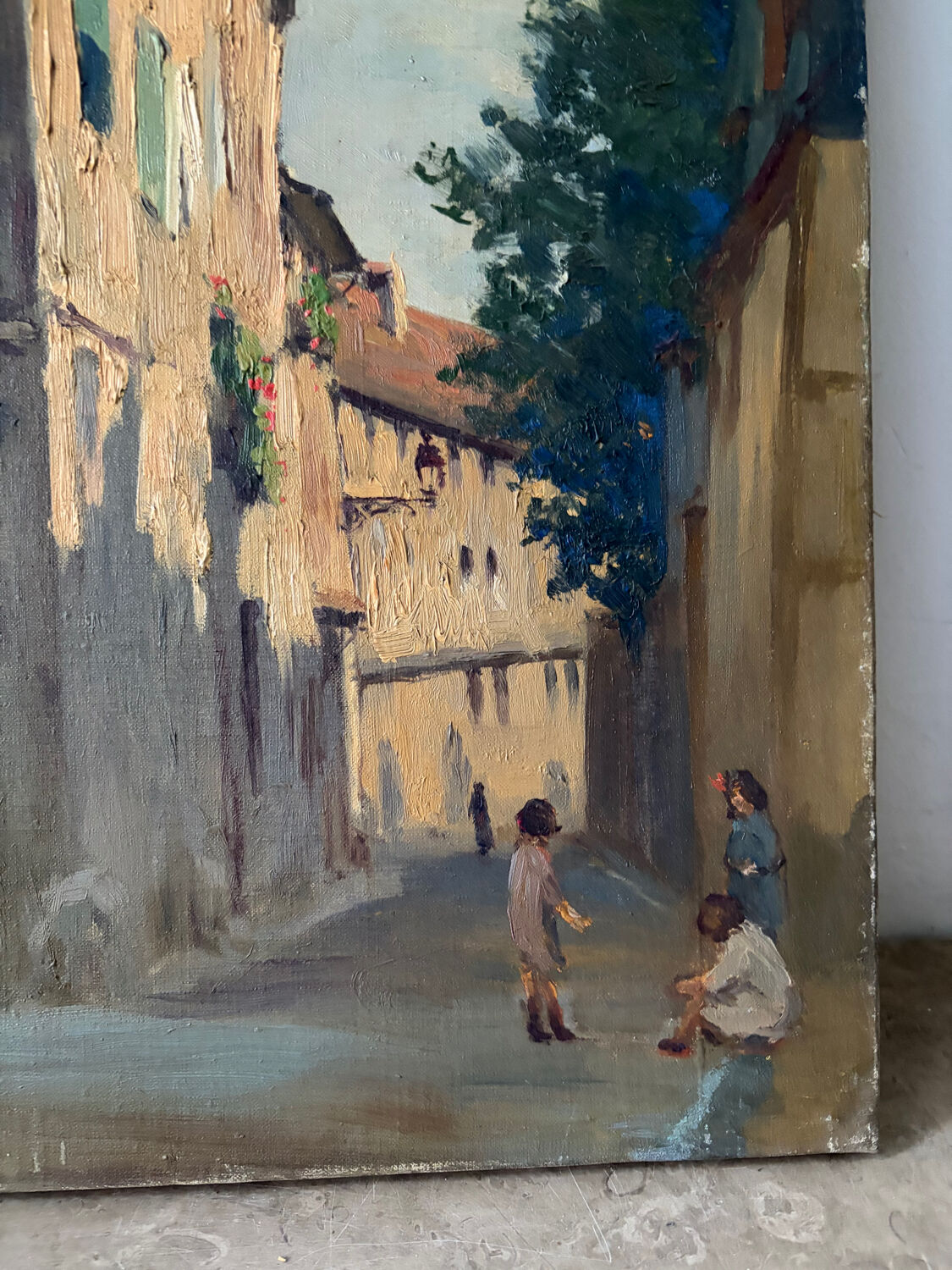 Sunny street scene, oil on canvas signed 1930.