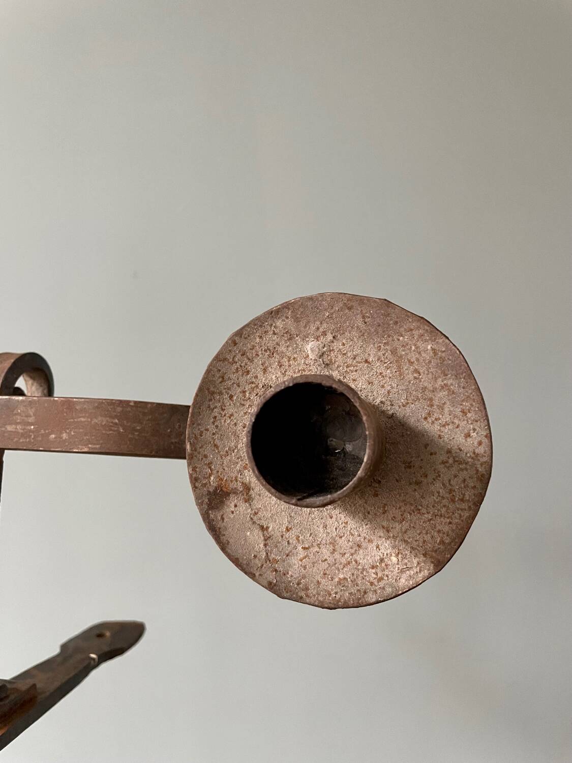 Brutalist wrought iron wall candle holder