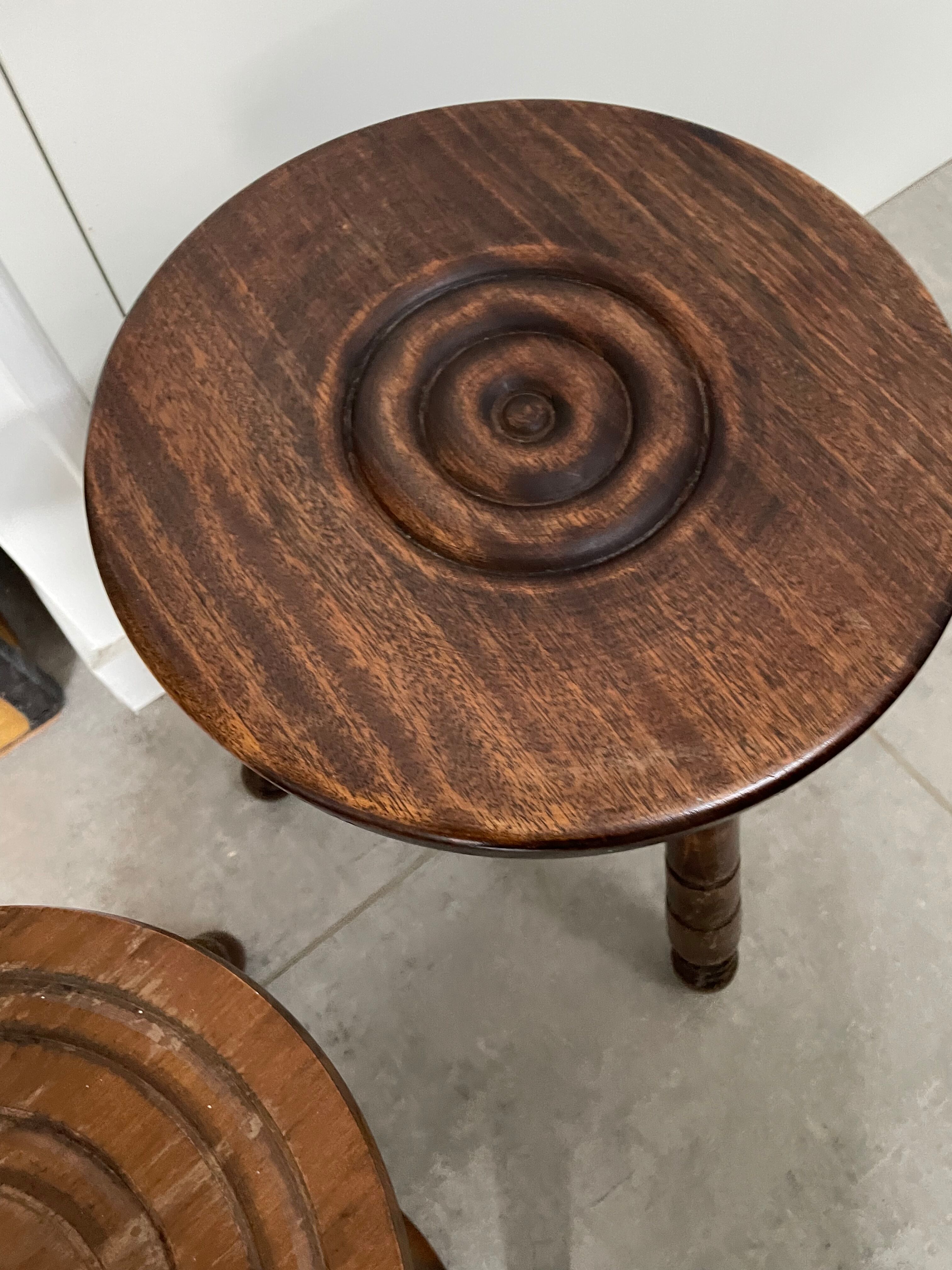 Set of two tripod stools in turned wood