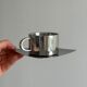 set of 4 stackable stainless steel coffee cups with saucers