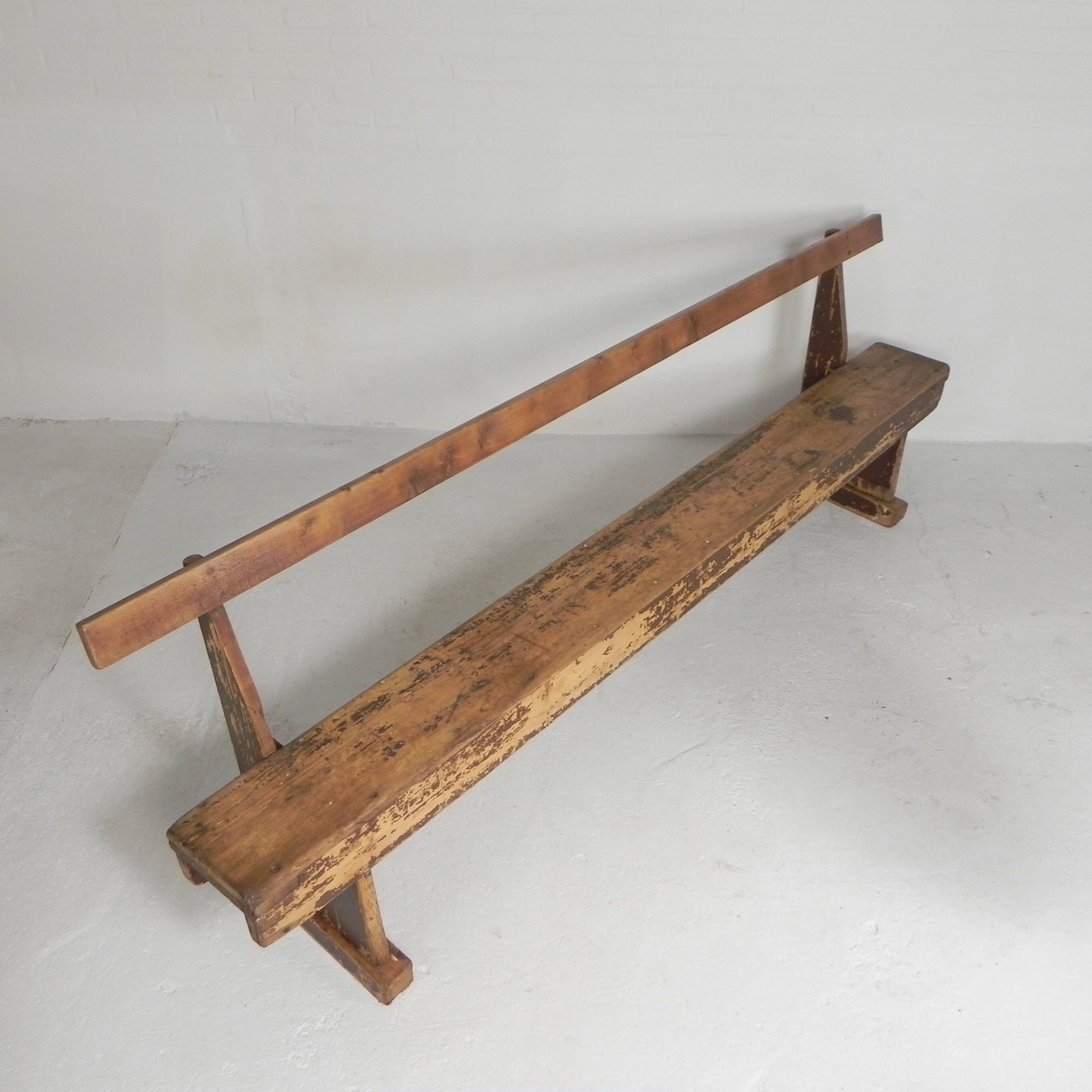 Pine bench with backrest, 2.5 metres long, 1950s.