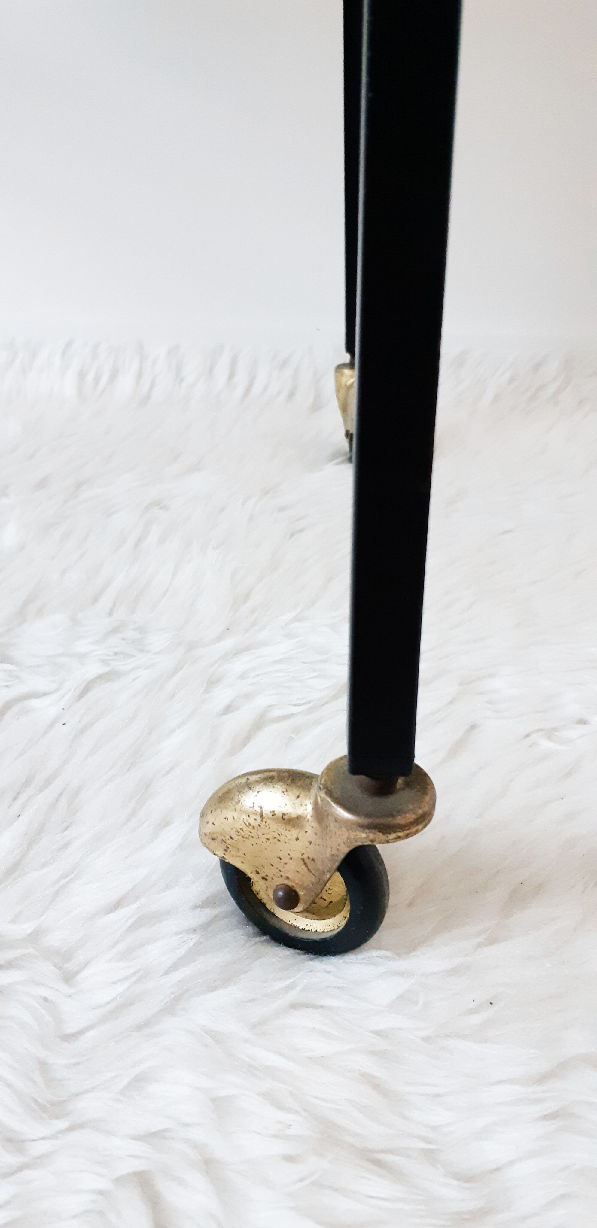 Table has record player, wearing vintage discs