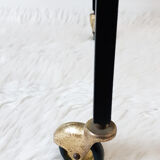 Table has record player, wearing vintage discs