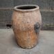 Old orange terracotta pot