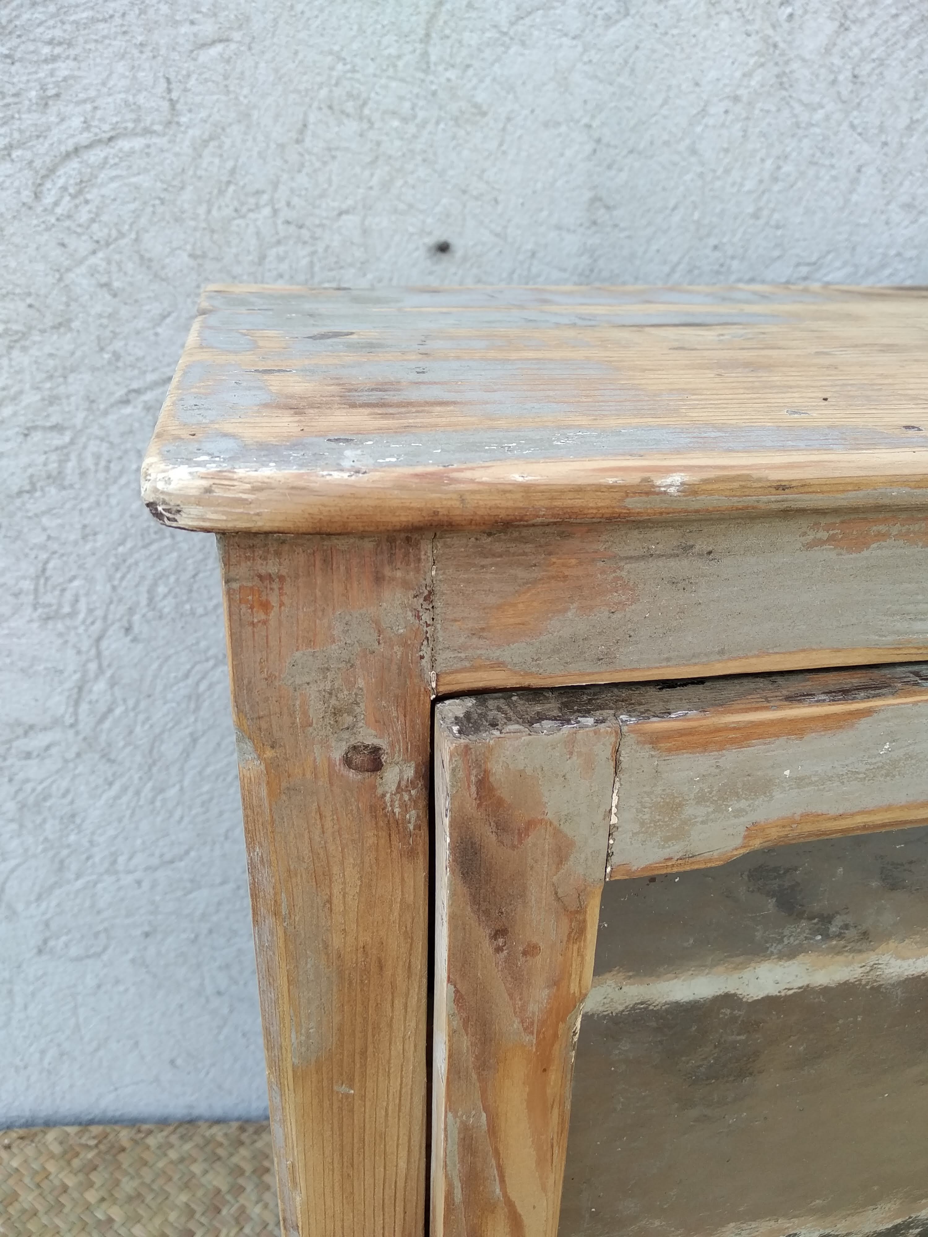 Antique wooden bathroom cabinet patinated