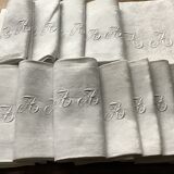 Tablecloth and 12 linen towels marked AA