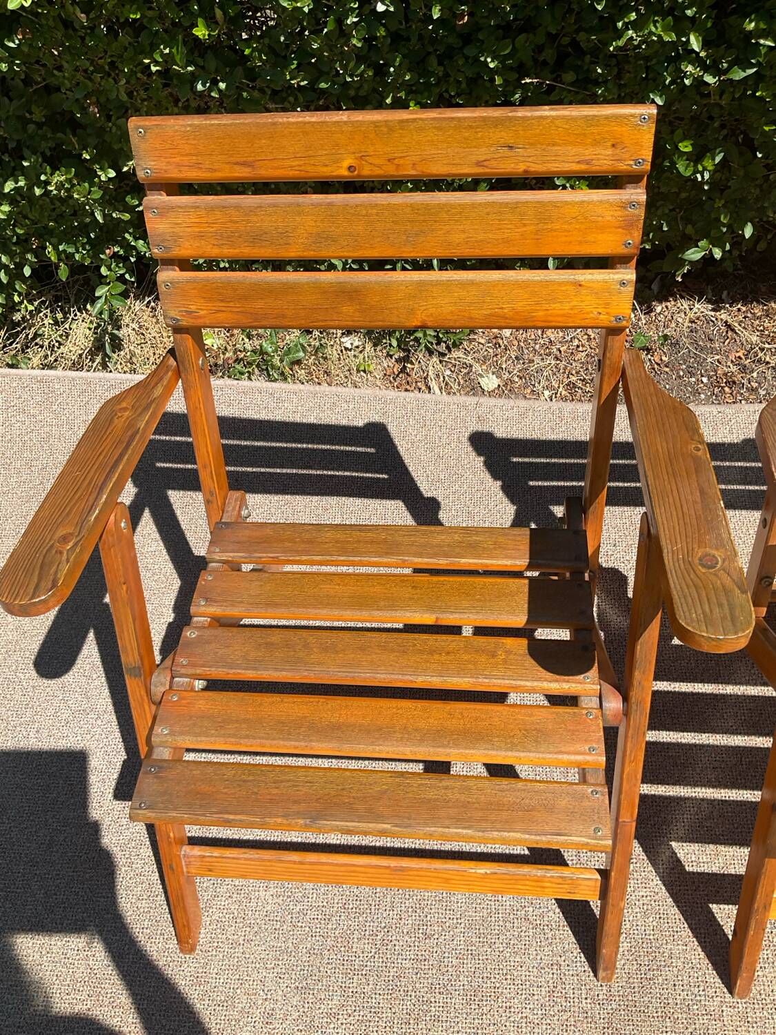 Pair of vintage wooden folding armchairs